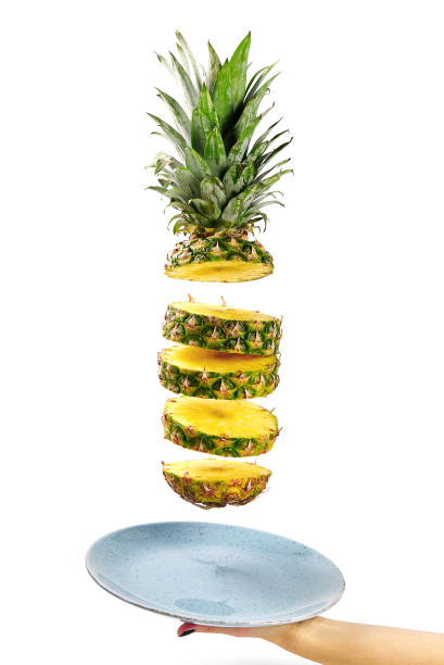 Pineapple fresh ananas. Pineapple sliced, levitates in the air. Concept of summer mood on white background, isolate. Tropical fruit. Pineapple fresh ananas. Pineapple sliced, levitates in the air. Tropical fruit. Concept of summer mood on white background, isolate. ananas stock pictures, royalty-free photos & images