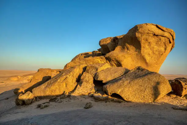 Landscape in Vogelfederberg, interesting rock formation in Namib desert in sunset, Namibia wilderness, Africa nature