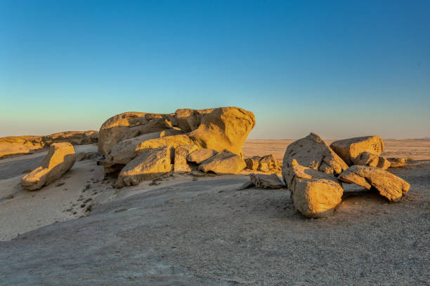 istock Rock formation in Namib desert in sunset, landscape 1281584149