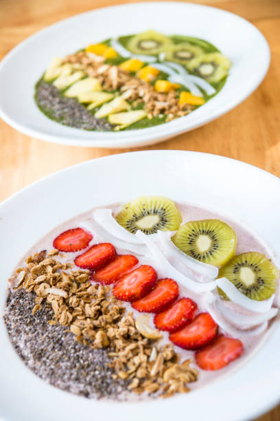istock Three different Smoothie bowl with a selection of fruit granola, chia seed and coconut yogurt 1281587752