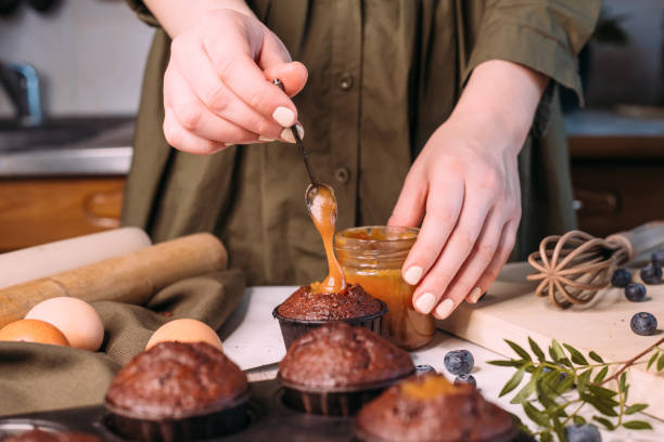 istock process making homemade chocolate cupcake with cream 1281588173