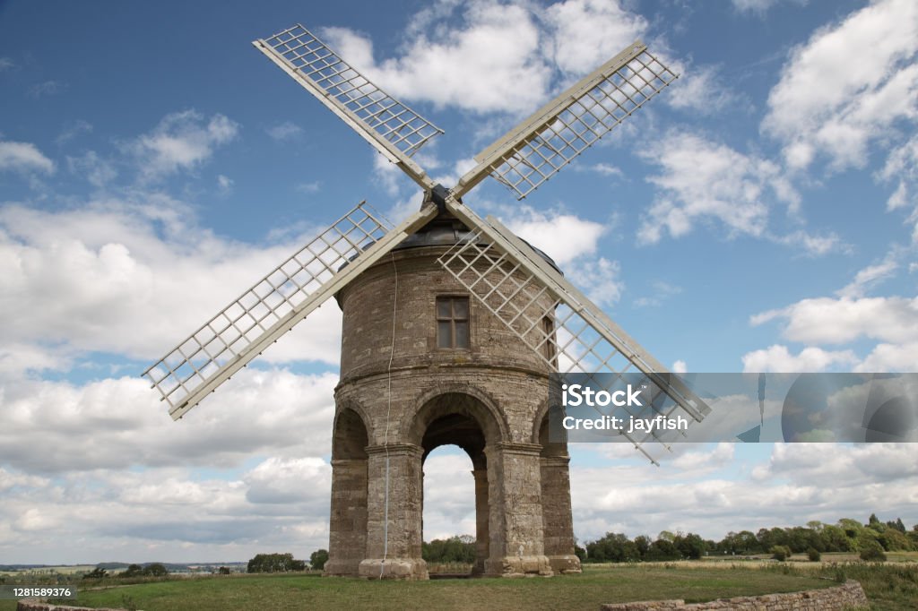 Chesterton Windmill stone tower windmill with an arched base landscape image of Chesterton Windmill a 17th century windmill with a unusual stone tower an arched base windmill in Warwickshire england Windmill Stock Photo