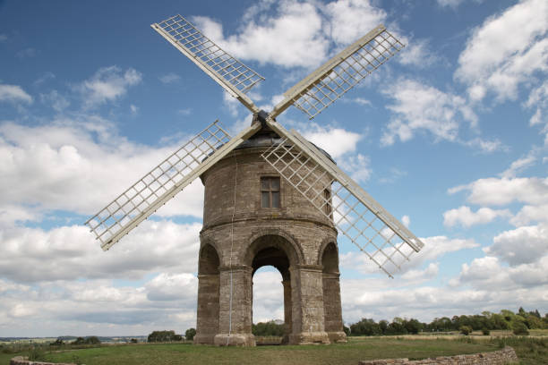 Chesterton Windmill stone tower windmill with an arched base landscape image of Chesterton Windmill a 17th century windmill with a unusual stone tower an arched base windmill in Warwickshire england chesterton photos stock pictures, royalty-free photos & images