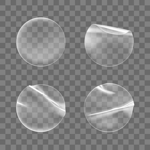 istock Transparent round adhesive stickers mock up set isolated on transparent background. Plastic crumpled round sticky label with glued effect. Template of a label or price tags. 3d realistic vector mockup 1281593050