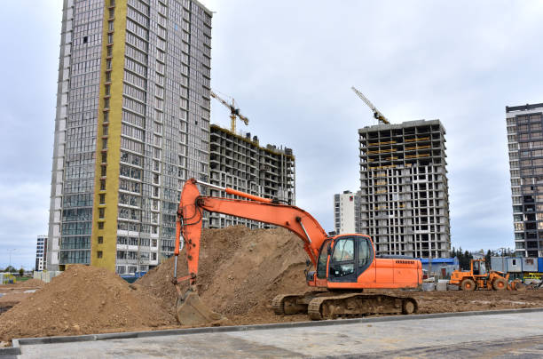 istock View of a large construction site where earthmoving equipment. 1281593569