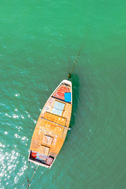 istock Boat anchored in the beach 1281595377
