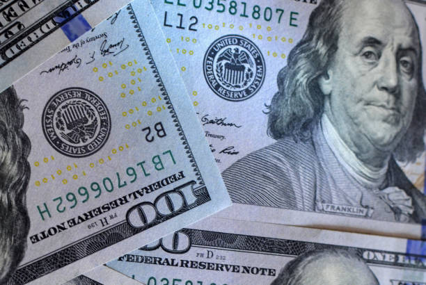 istock US one hundred dollar bills background. Money american hundred texture notes design 1281597692