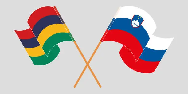 Vector illustration of Crossed and waving flags of Mauritius and Slovenia