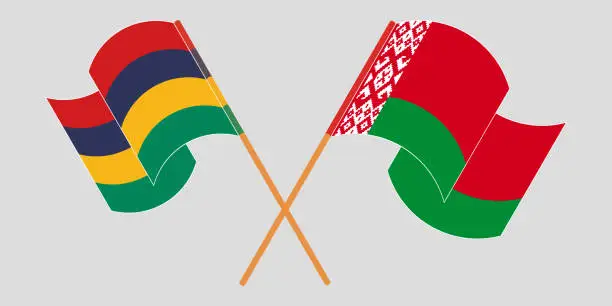 Vector illustration of Crossed and waving flags of Mauritius and Belarus