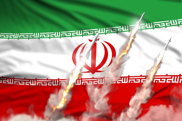 istock Modern strategic rocket forces concept on flag fabric background, Iran nuclear missile attack - military industrial 3D illustration, nuke with flag 1281598912