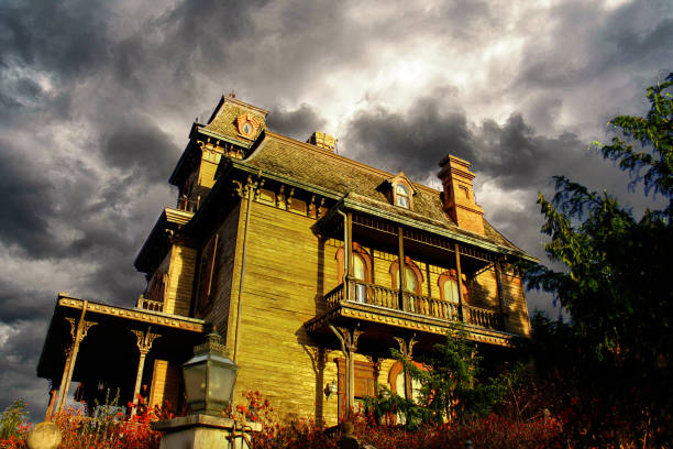 A hauntingly beautiful view of a longdecaying historic building, now surrounded by lush wild greenery