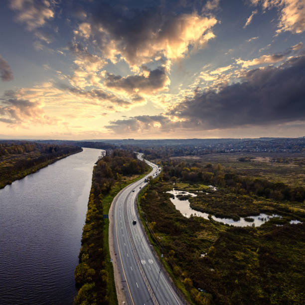 istock A highway along the river at sunset 1281603252