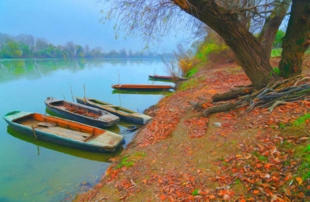 Oil landscape painting showing boats on the riverbank in autumn.