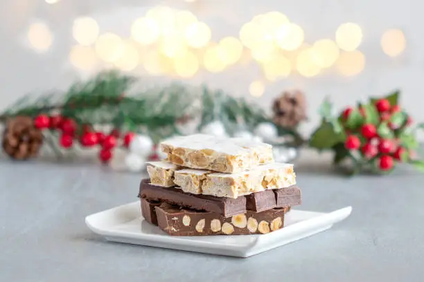 Spanish Christmas sweets turron and bright light in the background