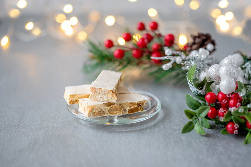 Spanish Christmas sweets turron and bright light in the background