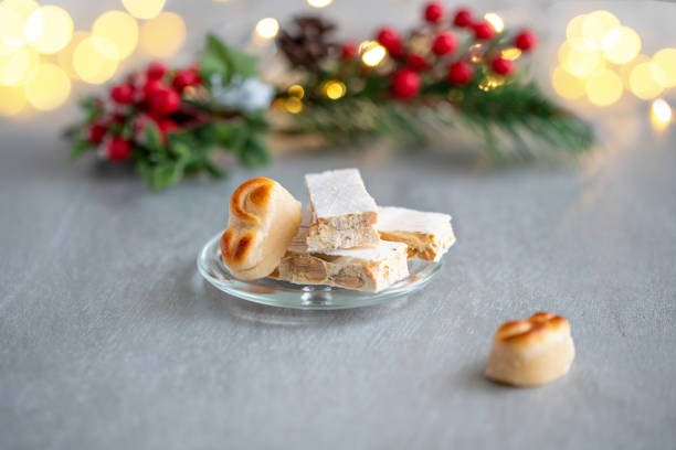 istock Spanish Christmas sweets turron, marzipan and bright light in the background 1281604806