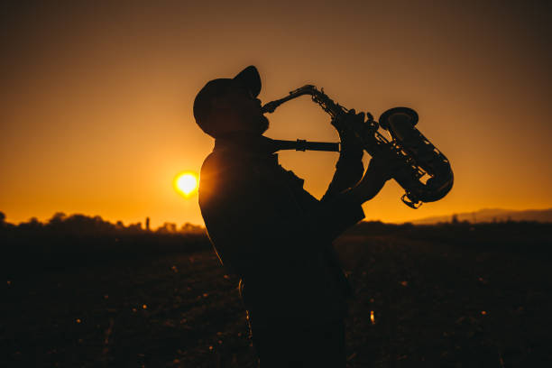 istock A young saxophonist at sunset 1281607620