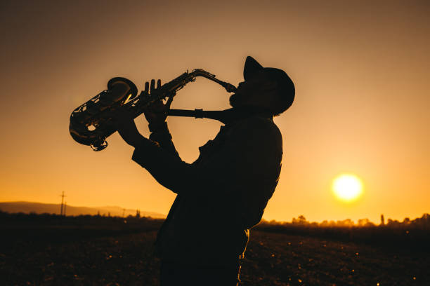 istock A young saxophonist at sunset 1281607822
