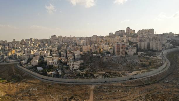 istock Israel and Palestine divided by Security wall Aerial view 1281608144