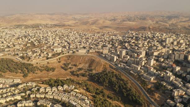 istock Israel and Palestine divided by Security wall Aerial view 1281608174
