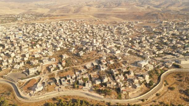 istock Israel and Palestine divided by Security wall Aerial view 1281608176