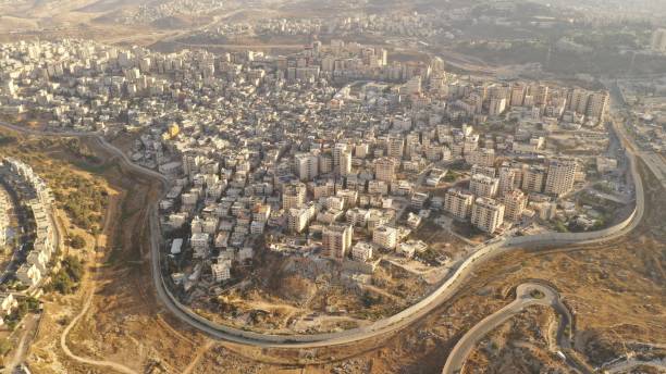 istock Israel and Palestine divided by Security wall Aerial view 1281608266