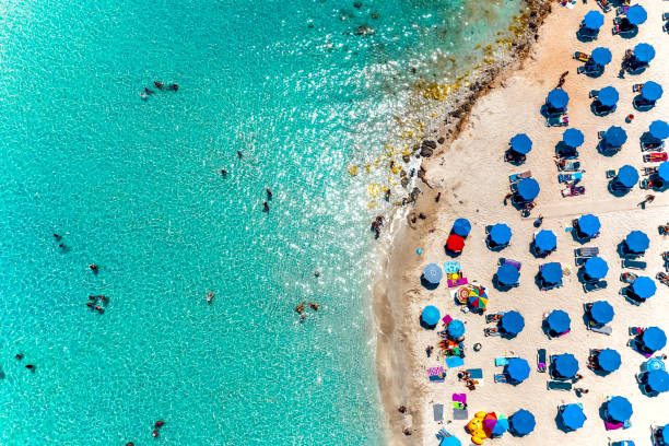Aerial overhead view of popular Nissi bay beach. Famagusta District, cyprus Aerial overhead view of popular Nissi bay beach. Famagusta District, cyprus cyprus agia napa stock pictures, royalty-free photos & images