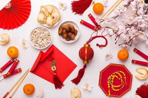 Chinese new year festival decorations, traditional accessories on white, top view