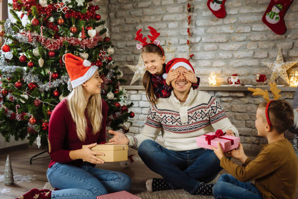 istock Opening Christmas presents at home 1281611354