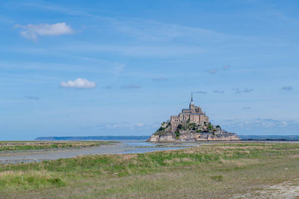 istock Mont Saint Michel at low tide, France, Normandy 1281612213