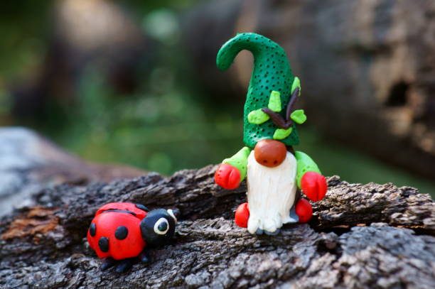 istock Figurine of a forest dwarf made of plasticine. 1281613615
