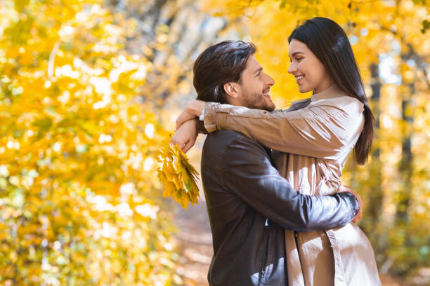 istock Romantic couple enjoying weekend at autumn forest 1281614202