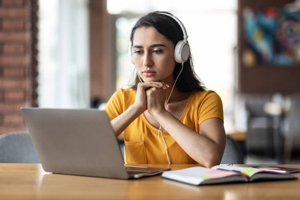 istock Concentrated young arab lady having educational course online 1281614209