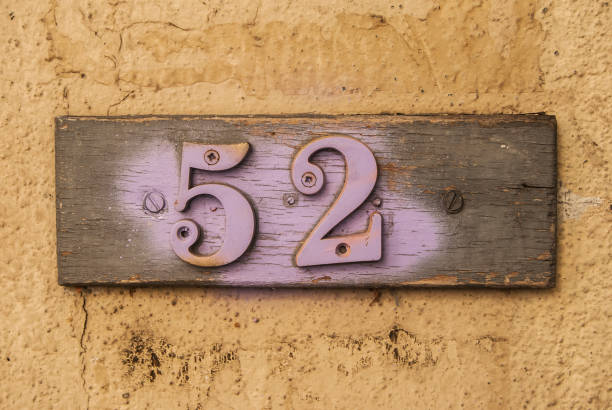 istock Weathered wooden plate number 52 1281614939
