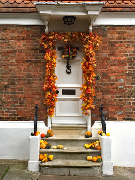 istock Door with Pumpkins 1281615474