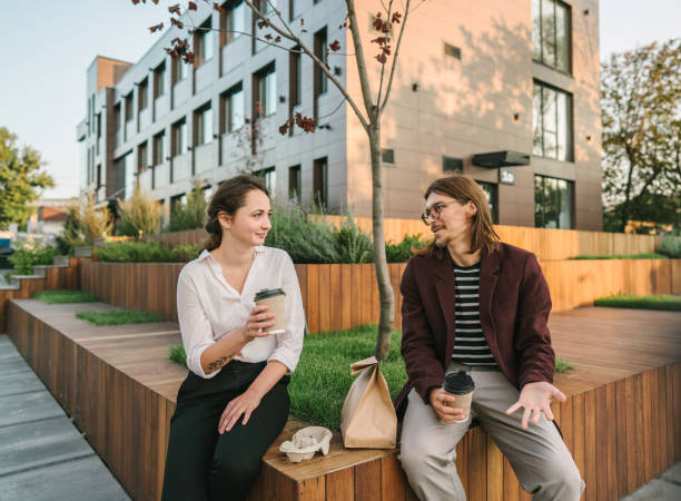 istock Man and woman having lunch in downtown district 1281616139