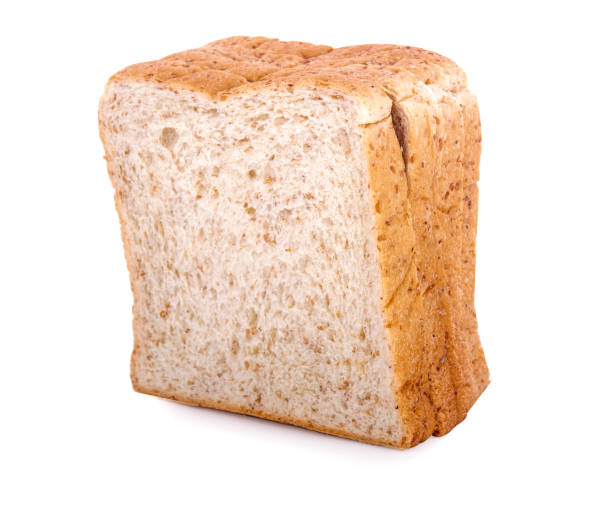 istock Whole wheat bread isolated on white background 1281617791