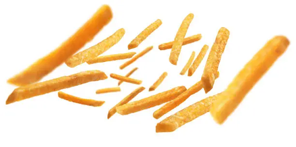 French fries levitate on a white background.