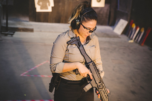 Woman at shooting range practicing