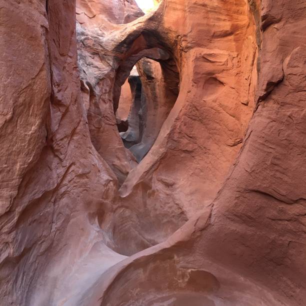 istock Peek-a-boo slot Canyon utah 1281620725