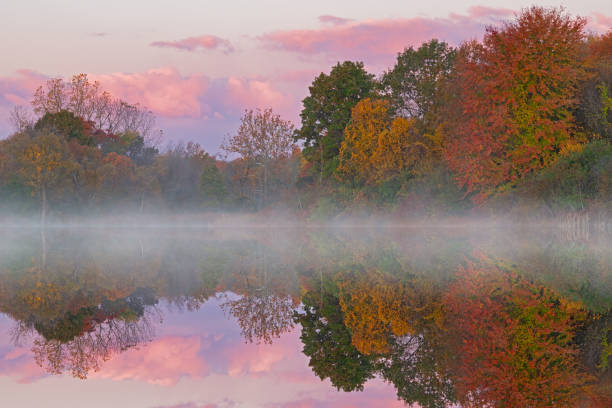 istock Autumn Dawn Whitford Lake 1281630574