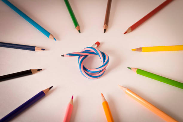 istock Flexible pencil and a set of colored pencils on a light background. Selective focus. 1281634417
