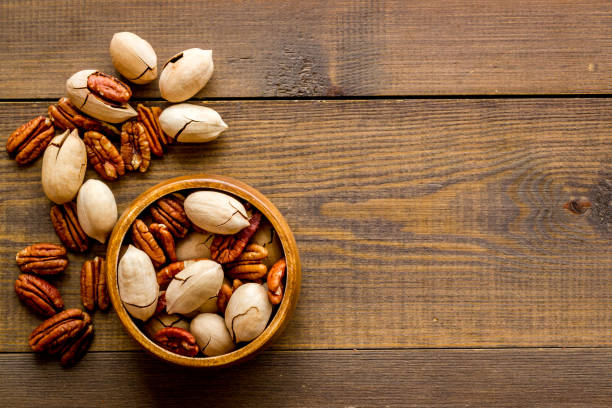 istock Top view of pecan nuts set. Food background 1281639041