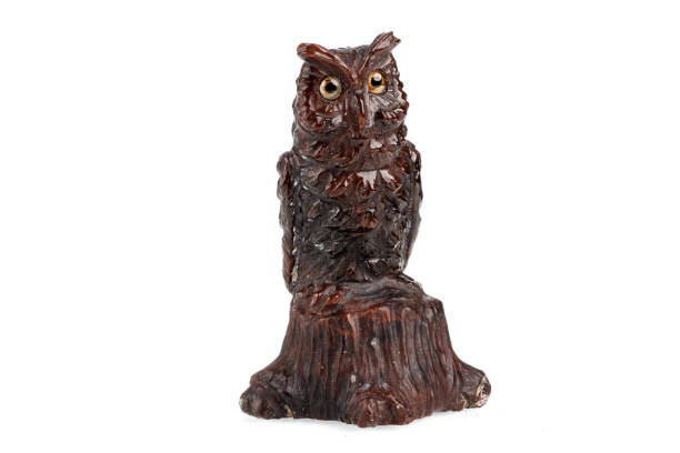 istock macro stone mineral owl from obsidian on a white background 1281639299