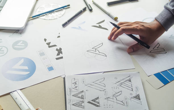 istock Graphic designer creative design sketch drawing logo Trademark brand Workspace 1281640630