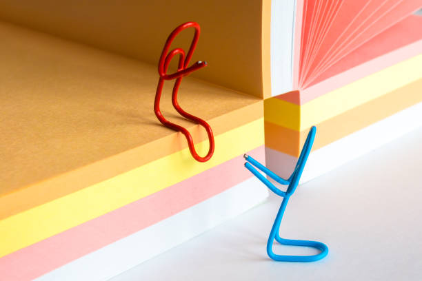 Paper Clips and Blank of Note Papers. Romantic workplace relationship concept, romance at the office concept