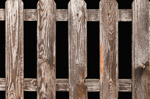 wooden fence isolated on a black background