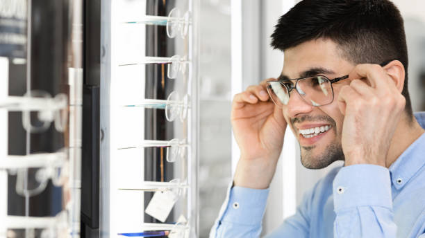 istock Portrait of smiling young guy wearing spectacles 1281642390