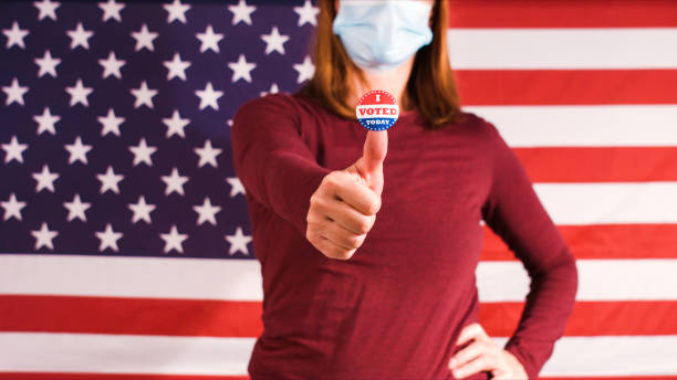 istock Woman showing elections sticker 1281645944