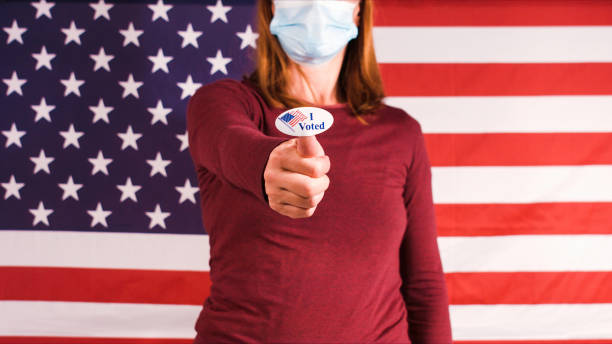 istock Woman showing elections sticker 1281646003